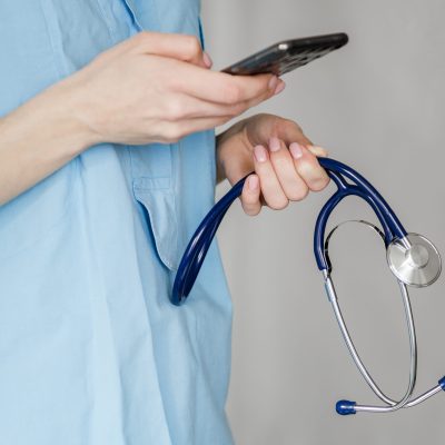 close-up-doctor-holding-stethoscope